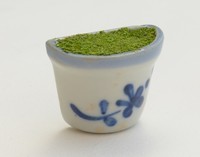 petit vase "demi-rond", motif fleur, avec mousse et he